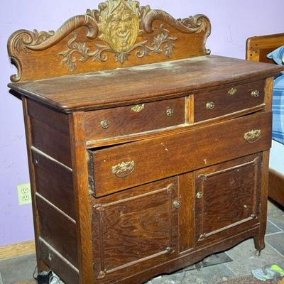 Antique Grotesque Carved Face Wooden Sideboard

