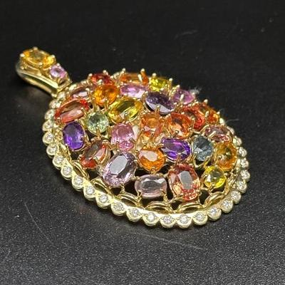 Sapphire and Diamond pendant on 14k gold setting