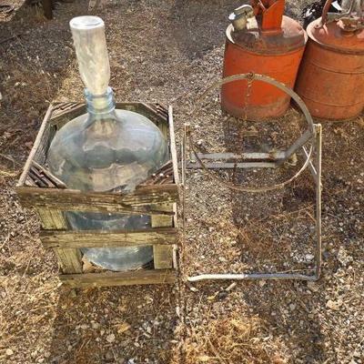 #1088 • 5 Gal Glass Water Jug with Wooden Create and Metal Stand
