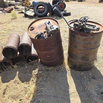 #4222 • (2) 55 Gal Drums with Pumps and (6) 10" Metal 
