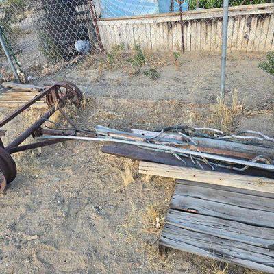 #3866 • Steel Wagon Axle with Scrap Metal
