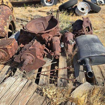 #4210 • Assorted Transmissions and Ford Muffler
