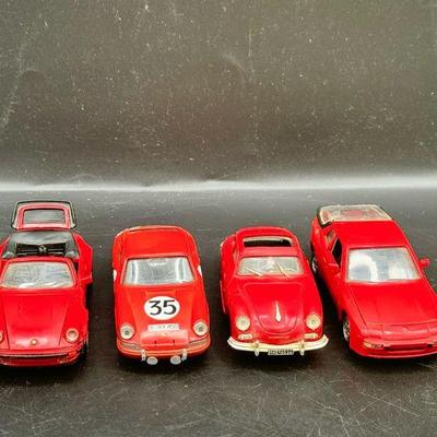 (4) Red Porsche Toy Cars
