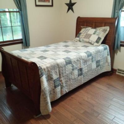 Twin size bed - includes free mattress & bedding