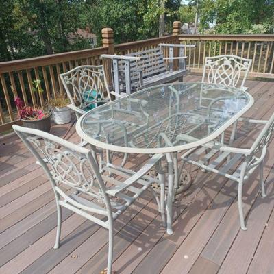 Patio set with 4 chairs and cushions 