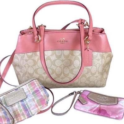 KAAR522 Coach Purse And 2 Coach Wristlets	Large purse is like new. Wristlets have been gently used. stitching in at bottom of blue lining...