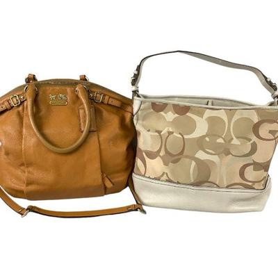 KAAR231 Two Ladies Coach Handbags	Two Coach designer handbags, made out of leather, both have leather straps, both show a little wear and...
