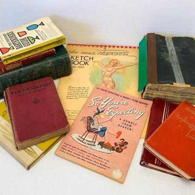 DEJE615 Vintage Cocktail Books And More	This vintage book lot includes a 1928 edition dictionary rebinded, How I found Livingston by...