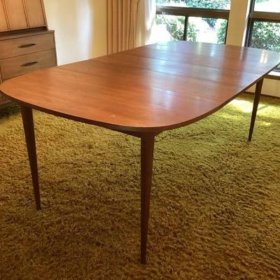 JEHA719 Mid-Century Modern Sculptra Broyhill Dining Table	Made of walnut, this collection was part of Broyholl's Premire line. It...