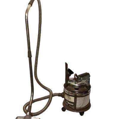 TEMA804 Filter Queen Vacuum Cleaner	Vintage vacuum cleaner from filter Queen. Includes four attachments and original pipe, tested and...