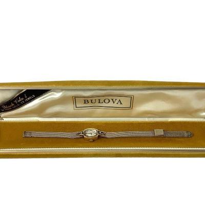 LYZE215 Vintage Bulova 14k Case, Ladies Watch	The case,( part that holds the dial, lens & face) is stamped 14k. Accented with 2 small...