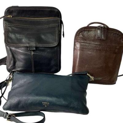 KAAR521 Three FOSSIL Crossbodies	Black leather with lots of pockets and Fossil key; small vintage brown leather Fossil crossbody; Slim...