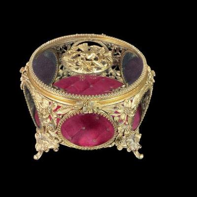 LYZE530 RARE Matson Six-sided Regency Box	Antique gold ormulu round Regency box. Each panel is beveled with a red velvet tufted lining.
