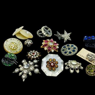 KIHE909 Assortment Of Vintage Rhinestone Buttons	Assortment of beautiful, colorful buttons. Most are metal. One celluloid and other...