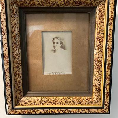 Antique Family Portrait in Ornate Frame
