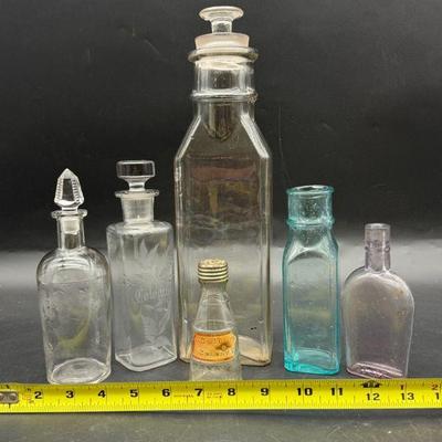(6) Larger Antique UV Reactive Bottles
