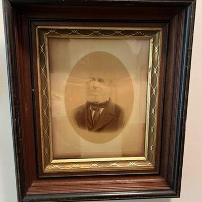 Antique Family Portrait in Ornate Frame
