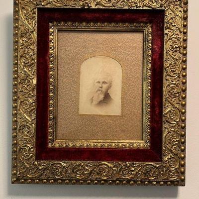 Antique Family Portrait in Ornate Frame
