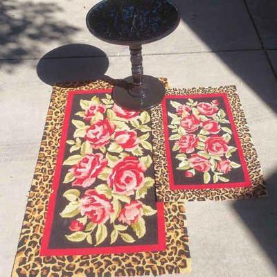 Two Cheetah And Rose Rugs With Black Pedestal Round Table