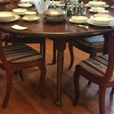 52" round drop leaf table $99
set of 5 chairs 125