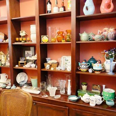 Built in shelving loaded with ironstone, pottery, crystal, ceramic, decoratives, tea pots, vases