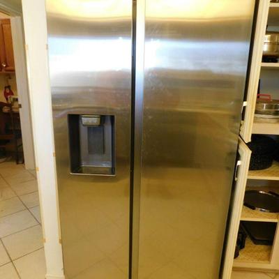 Brand new, manufactured 2024, Samsung side by side refrigerator, with water and ice dispenser, still under warranty