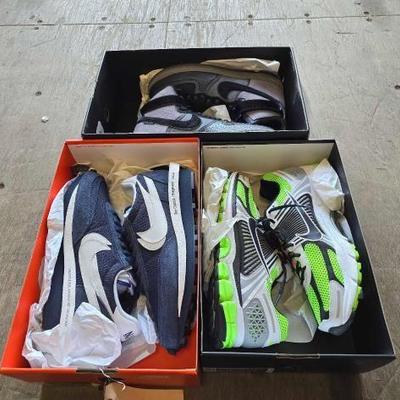 #4040 • (3)Pairs of Nikes