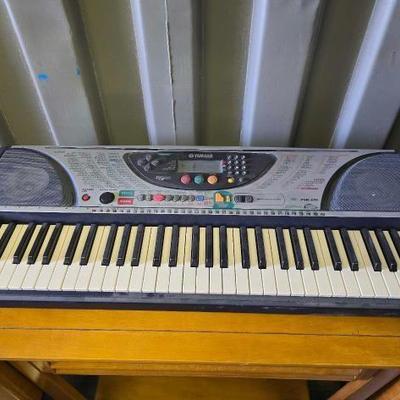 #10520 • Yamaha Portatone Electronic Keyboard
