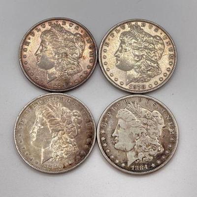 #1350 • (4) 1878-1884 Morgan Silver Dollars