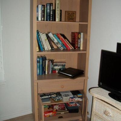 Light Oak Bookshelf/Cabinet ; Books ; Board Games.