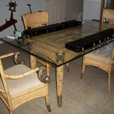 Palm Tree Table with glass top and 4 chairs ( 2 chairs with arms and 2 without) ; 6 - 32 pen carrying case(s).