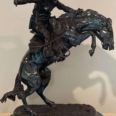 The Bronco Buster by Frederic Remington