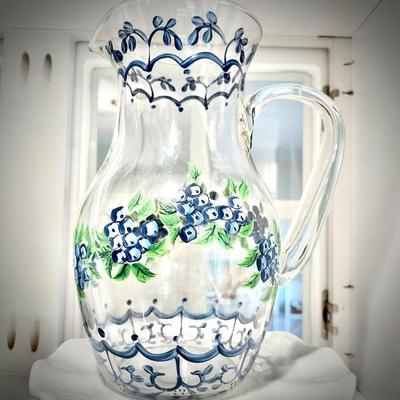 Hand-painted glass pitcher with blueberries on white cake plate