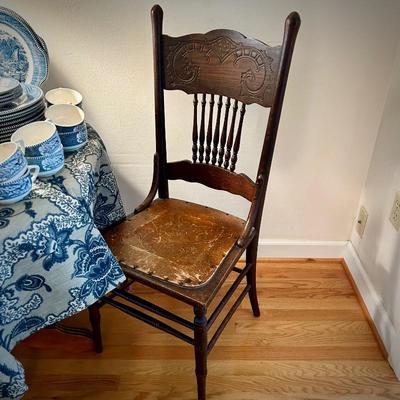 Antique chair with leather seat