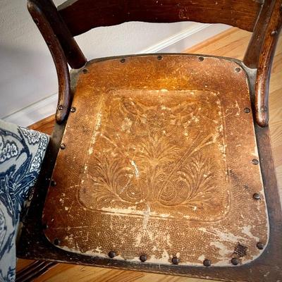 Antique chair with leather seat