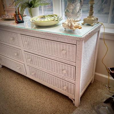 White wicker dresser with six drawers and glass top