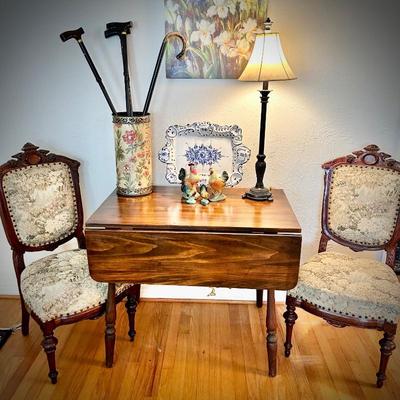 Antique rectangular drop-leaf table with pair of antique chairs