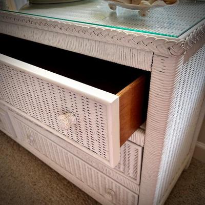 White wicker dresser with six drawers and glass top