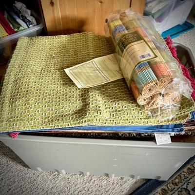 Pine armoire filled with linens (tablecloths, runners, napkins, and placemats) and fabric remnants