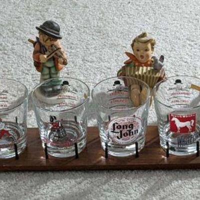 WST059 (6) Large Sized Whiskey Glasses and (6) "Goebel" Figures Made In West Germany By M.J. Hummel.