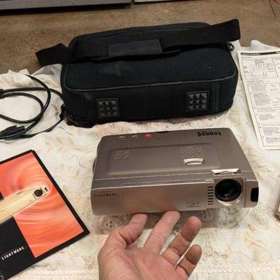 WST106 Compact "Lightware" Color Movie Projector 