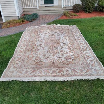 Medium pile area rug. no stains. 102" X 138".  $65