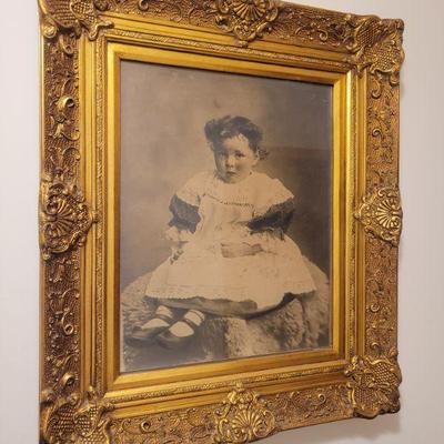 Antique photograph of young girl in a superb gilt frame.
25" X 29"
$140
