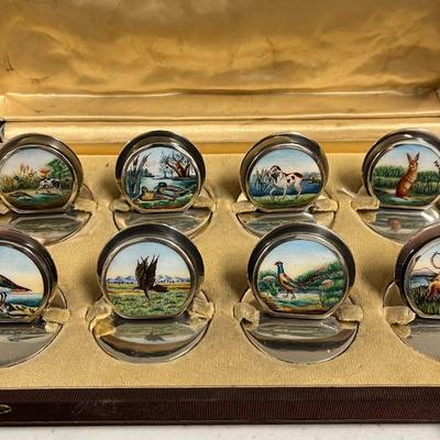 Sterling and enamel place card holders from Gucci
