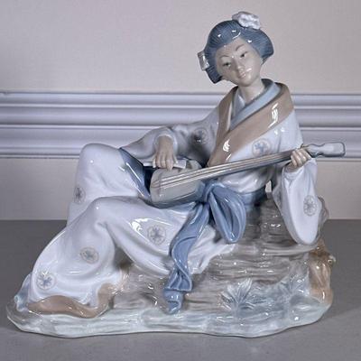 NAO BY LLADRO ORIENTAL MELODY FIGURINE | Large porcelain Nao by Lladro figurine of Geisha Girl Playing Shamisen. - h. 10.5 x w. 4.5 x l....