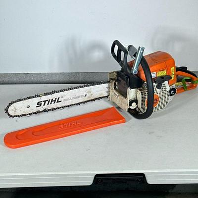 STIHL MS 250 GAS CHAINSAW | STIHL MS 250 gas-powered chainsaw with Stihl multi-tool wrench. - h. 11 x w. 10 x l. 32 in

