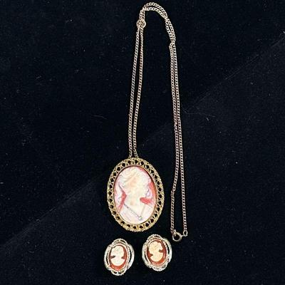 CAMEO JEWELRY | Including: carved Cameo pendant/brooch with mixed metal chain, and pair of cameo clip-on earrings. - w. 1.5 x l. 2 in...