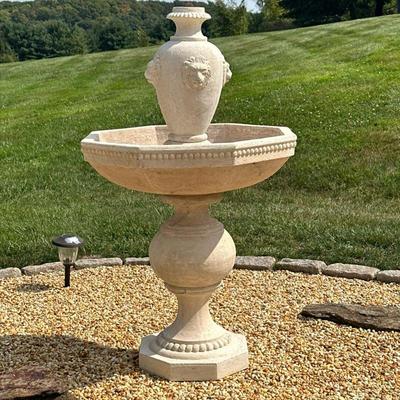 COMPOSITE OUTDOOR FOUNTAIN | Having formed composite vase with lion head relief over octagonal basin on pedestal base. - h. 49 x w. 28 x...