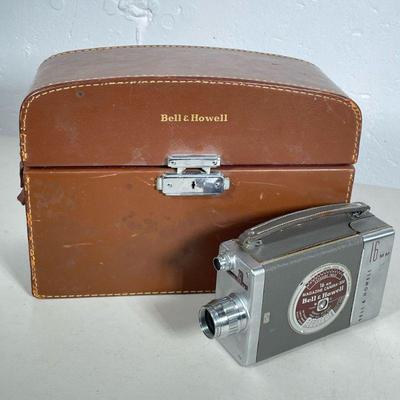 BELL & HOWELL 200 16MM MOVIE CAMERA | Bell & Howell 16mm Magazine Camera 200 in leather case with original paperwork & film....