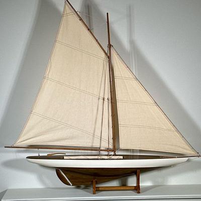 MODEL SAILBOAT | Model sailboat on stand. - h. 42 x w. 7 x l. 43 in

